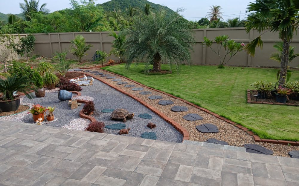 Home by the beach for sale – back landscape view